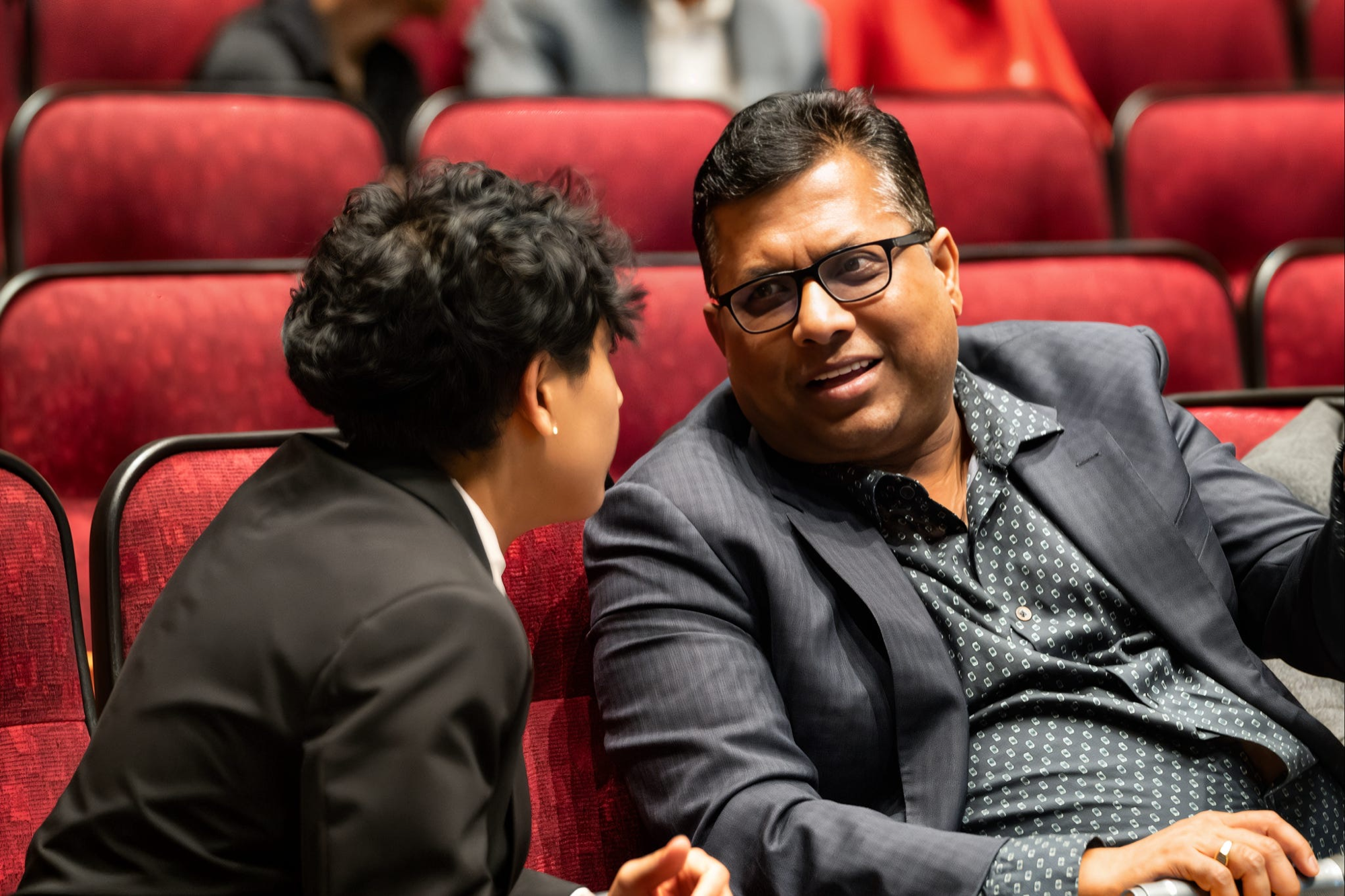 A founder giving personalized feedback to a student